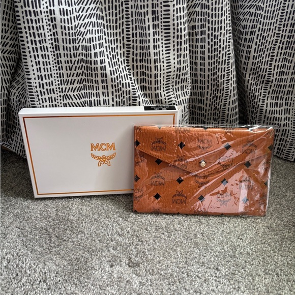 MCM Tan Monogram Envelope Clutch - Picture 1 of 5
